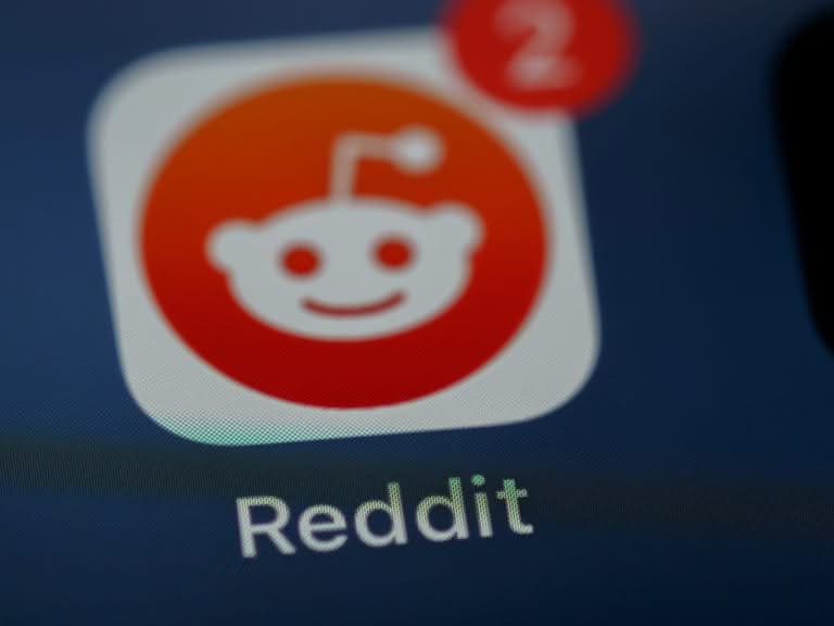 Close-up of Reddit app icon with a notification badge